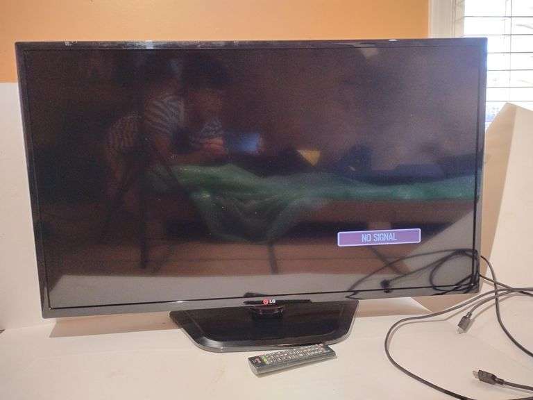 42" LG TV, Flat Screen, powers up though not hooked up to cable, remote included. image