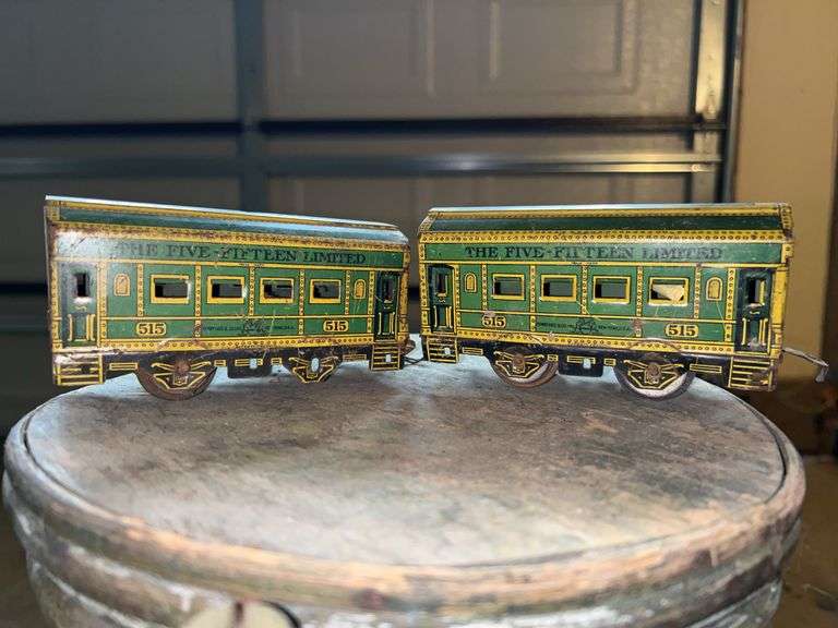 (2) Henry Katz & Co. 'O' gauge tinplate lithographed 4-wheel passenger coach, part of "The Five Fifteen Limited" train set….one is incomplete image