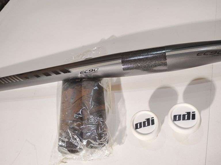 Truvati Atmo 7K Riser Handlebar, ODI Bar End Plugs, Grips image