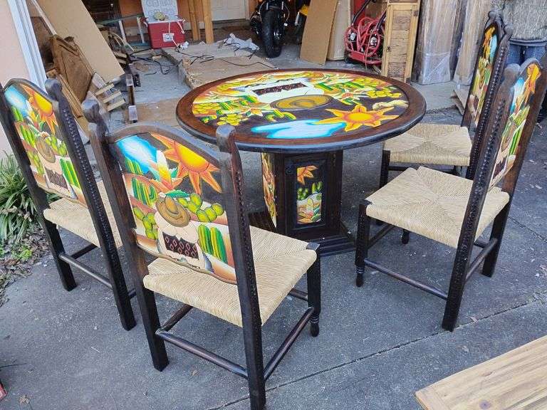 New LaFuente "Siesta" Dinning Set. Lot#193 round glass top will work on this masterly hand carved table with four sided pedestal base with hidden storage in base, unique work of art. Retail $1315, 47" across, 32" T, Chairs back height 43"T, seat height 18" T, 20"W. Retail $329. image