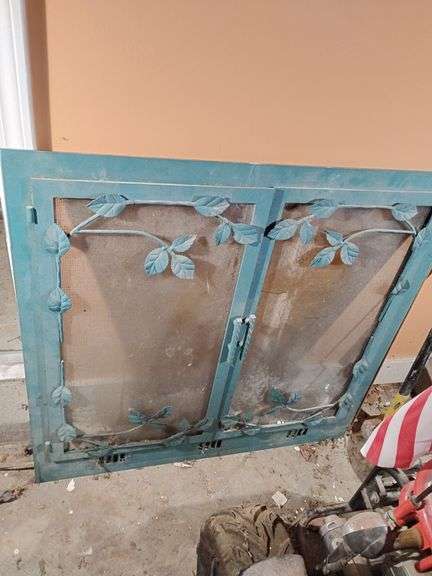 Fireplace Insert, Used, Torquois Blue Iron, double glass doors with double screen doors behind, equipped with electric blower workings at bottom grills. Mounting brackets measure 34 3/4" across, would fit hole 35 3/4"T, overall outside dimensions are 37 1/2"T x 38 1/4"W. image