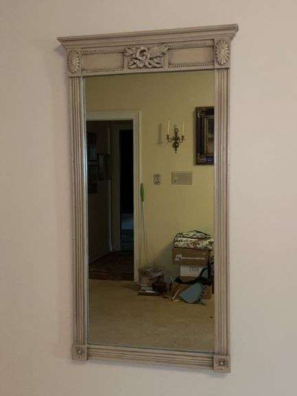 Decoratively framed wall mirror…..20 x 40 image