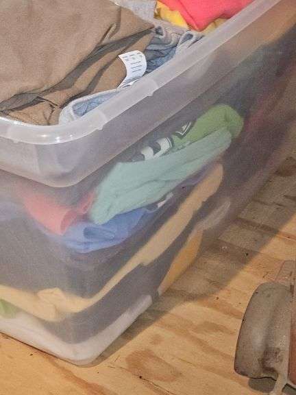 Tub of ladies t-shirts and sweatshirts. Size medium.