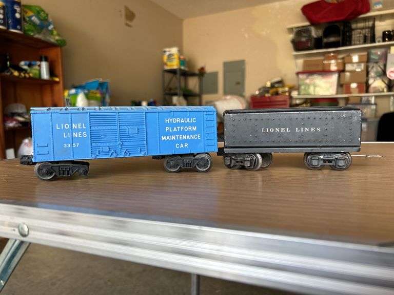 (2) Lionel Train Cars….Lionel Lines 3357 (missing an axle) and Lionel 1689T Tender