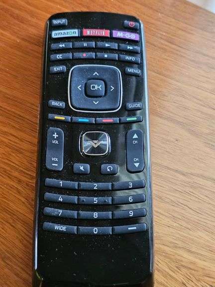 Vizio 38-in flat screen TV with remote. Does not include mount. Turns on, no cable connection.