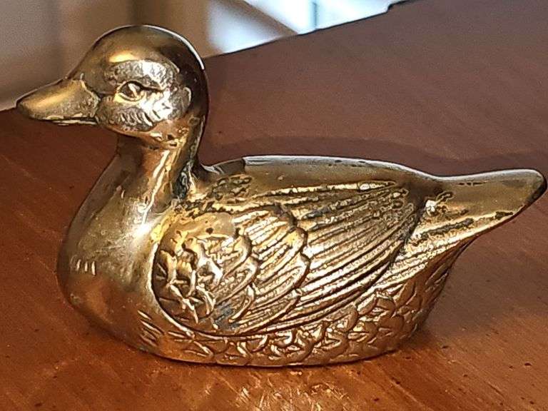 Three collectable ducks.