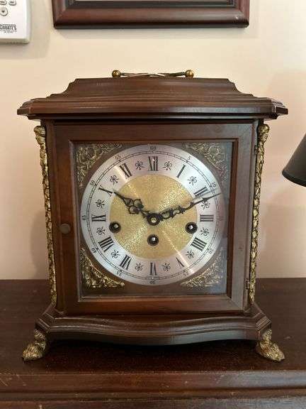 Vintage Franz Hermle & Sons Germany mantel clock with key and brass feet…..working condition….5820/4 on back….340-020 on workings….10-1/2 x 6-1/2 x 11 tall