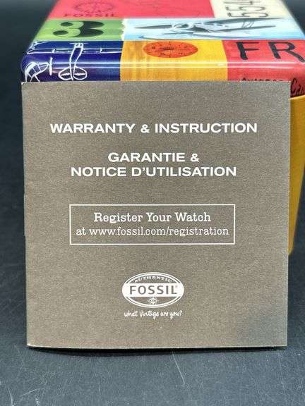NEW with tags and original tin authentic ladies Fossil watch with leather and stainless band