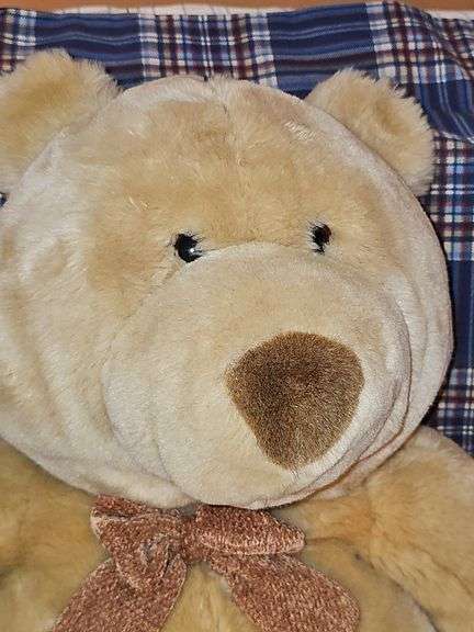 Commonwealth tan teddy bear with bowtie.
