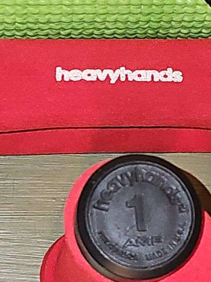 Yoga mat, hand weights, ankle weights, and gloves.