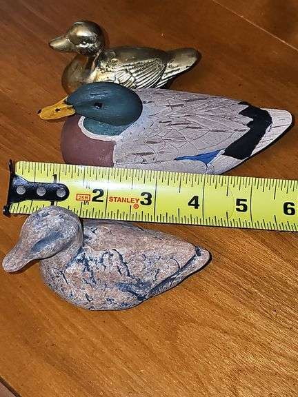Three collectable ducks.