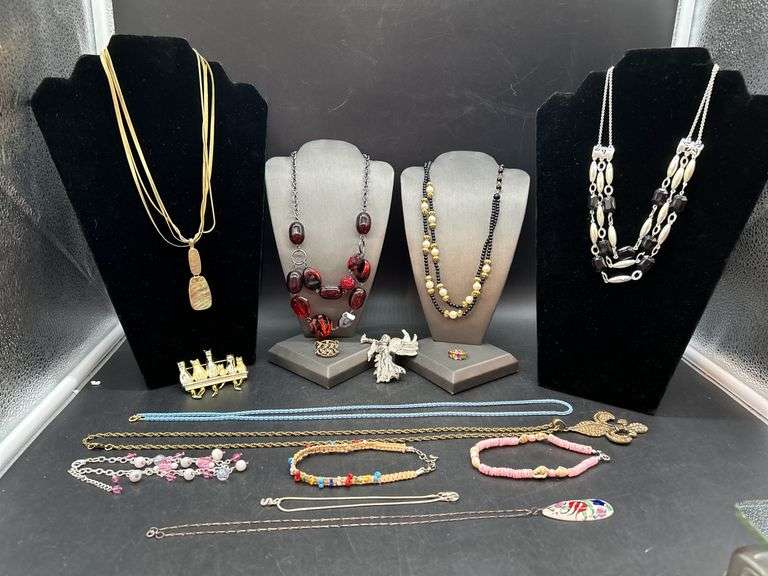 Great selection of costume jewelry…..back left is Monet, middle are ankle bracelets, very front has sterling clasp