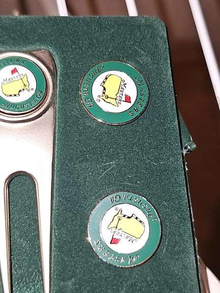 Masters divot tool and ball marker set.