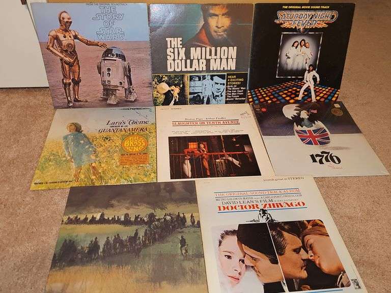 Albums containing music from shows. The story of Star wars, Six Million Dollar Man, Saturday night fever, Laura's theme, slaughter on 10th Avenue, 1776, Dr Zhivago, and paint your wagon.