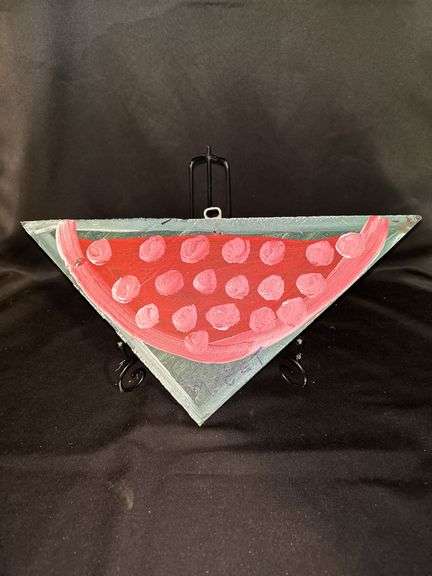Original signed Mose T red meat watermelon with pinkish white seeds Folk Art with signature soda can tab hanger…..14-1/4 x 7-1/2 image