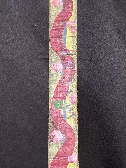 Original signed Mose T long skinny maroon snake Folk Art with signature soda can tab hanger…..1-3/8 x 21
