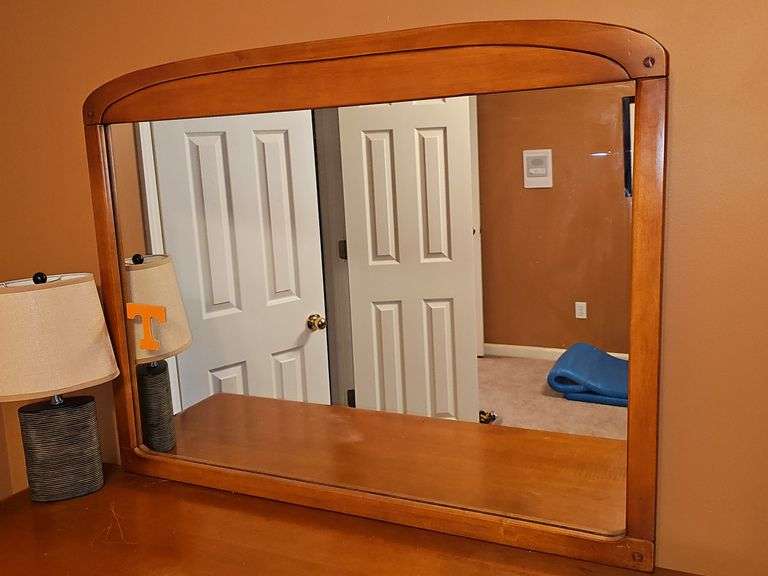 Empire Furniture Corp 8 drawer dresser with mirror, and lamp. Decal on mirror is adhesive. 54 x 20.5 x31 in tall. Mirror is 42.5x 33 in tall. Lamp is 17.5 in tall. Contents not included.