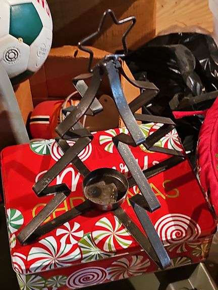 Tub of decorative Christmas items.
