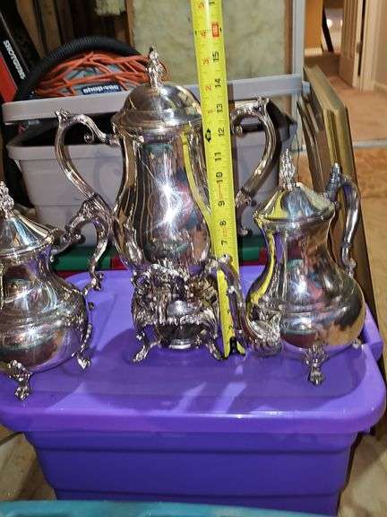 Tub of silver plate items. Two teapots, heated coffee pot, covered sugar, and creamer.