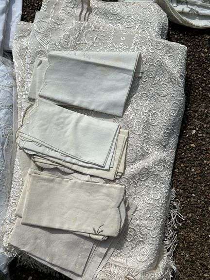 Wide variety of table linens and 1 new bath rug…..sizes unknown