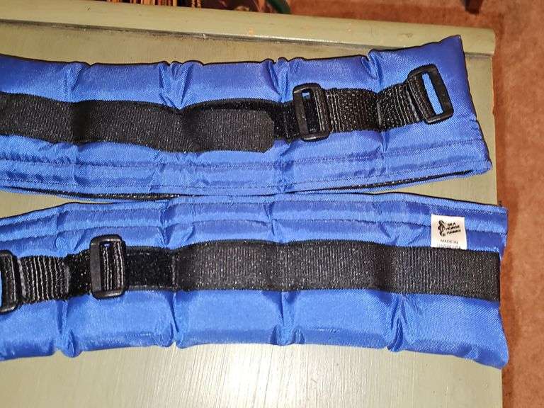 Yoga mat, hand weights, ankle weights, and gloves.