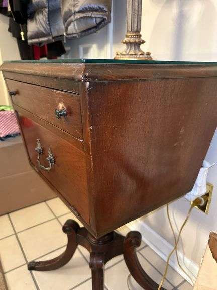 Antique mahogany Duncan-Phyfe style table with single drawer, pull-down compartment and claw feet (not brass)…..20 x 16 x 30 tall….does have glass overlay