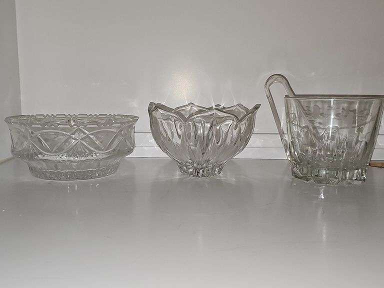 8.5 in crystal bowl, 7.5 in crystal lotus bowl, 6-in crystal ice bucket with tongs.