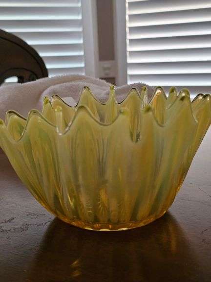 Yellow glass bowl. 5x4 in tall.