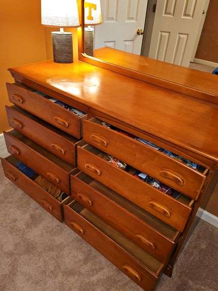 Empire Furniture Corp 8 drawer dresser with mirror, and lamp. Decal on mirror is adhesive. 54 x 20.5 x31 in tall. Mirror is 42.5x 33 in tall. Lamp is 17.5 in tall. Contents not included.