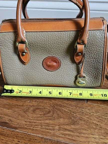 Dooney & Bourke handbag with shoulder strap.