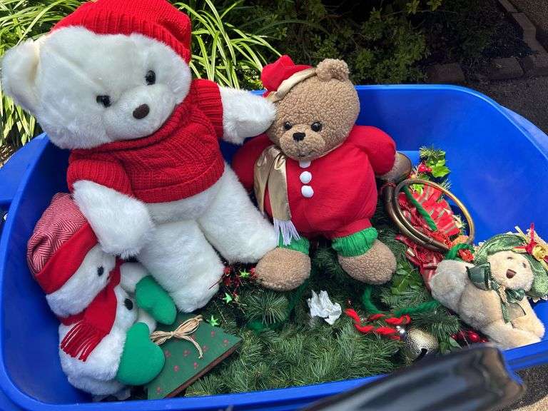 Tote full of Christmas decor and heavy duty tree stand