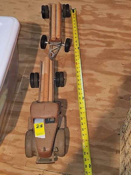 Steel logging truck and trailer.