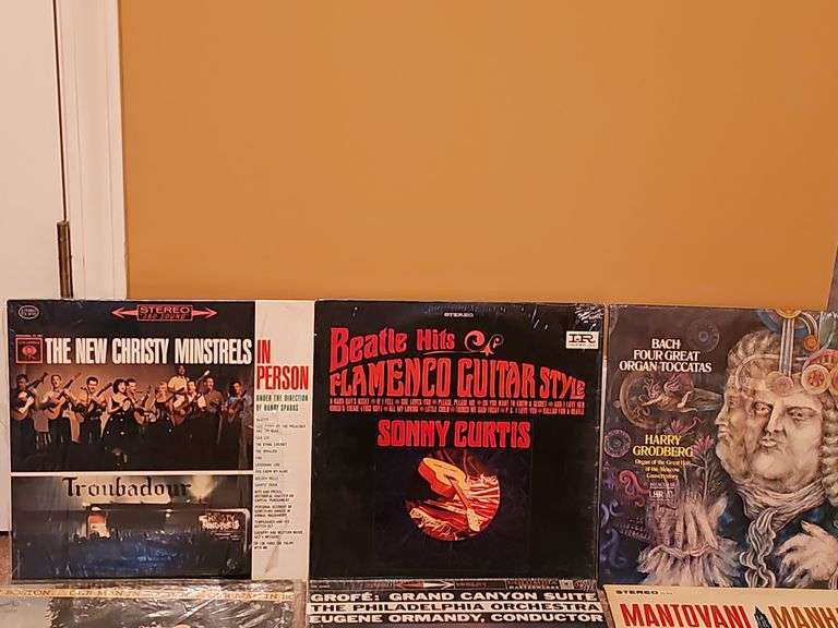 Grouping of albums. New Christy minstrels, Beatles flamenco guitar style by Sonny Curtis, Bach organ toccatas, and more.