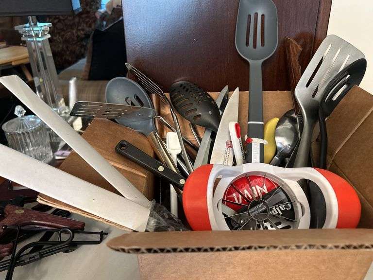 Box of kitchen utensils……knives, spoons, spatulas, corer and more…..there is a new calphalon slotted and new carving set (see pics)