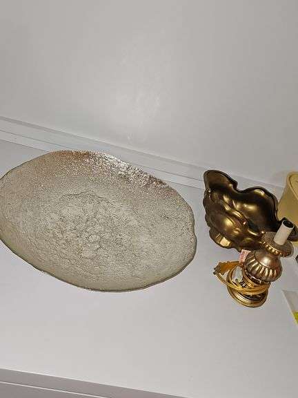 17-in shallow bowl, 8 in tall gold lamp with no shade, 11 in gold planter.