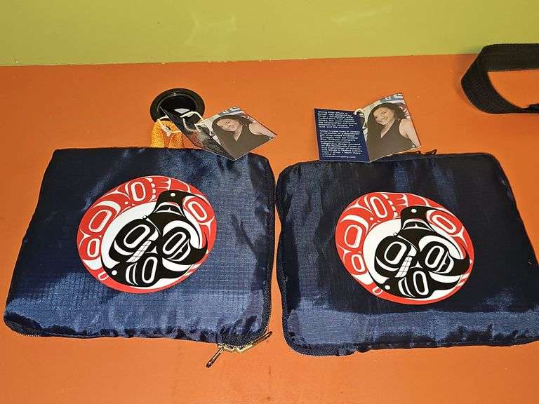 Two Holland America travel bags and a UT Vols bag