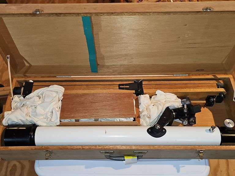 Telescope in wood case.