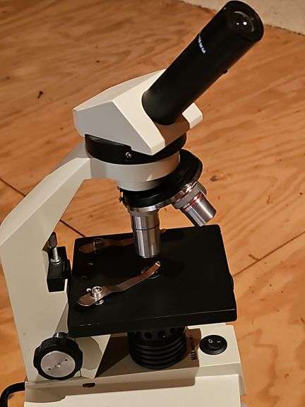 Tub of Star wars, microscope, and desk light.