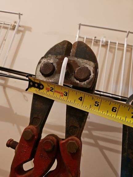 Crowbar and very large bolt cutters.