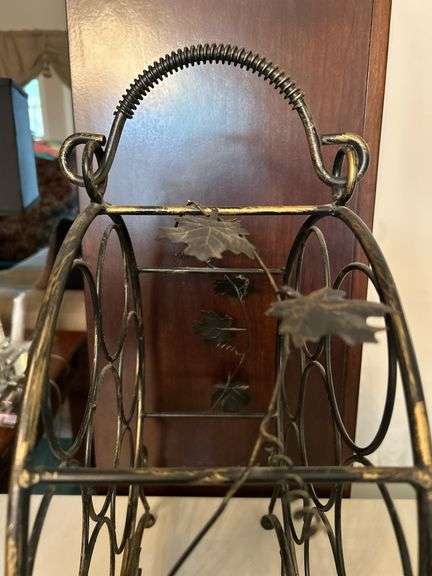Unbranded Countertop Wine Bottle Rack with grape leaf side design…..13-1/2”D x 17-1/4” tall