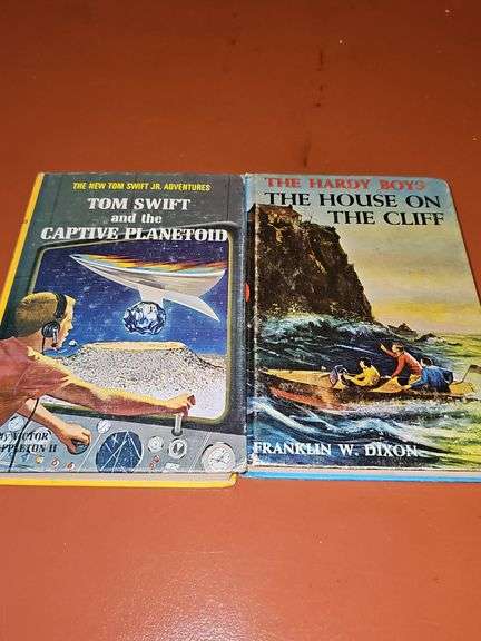 Tom Swift books volumes one through 10 inclusive with dust covers, and volume 29. Also included the Hardy boys series book 2. Tom Swift copyrights run from 1954 -1957 and 1967. Hardy boys copyright 1959. See all photos