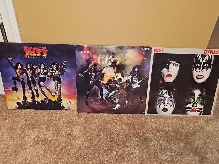 Three albums by KISS. Destroyer, ALIVE!, Dynasty