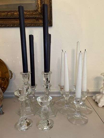 Very nice selection of various height clear glass and crystal candle sticks image