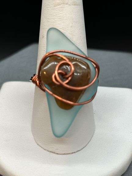 Uniquely designed copper wire ring with blue & brown stone…..size 10