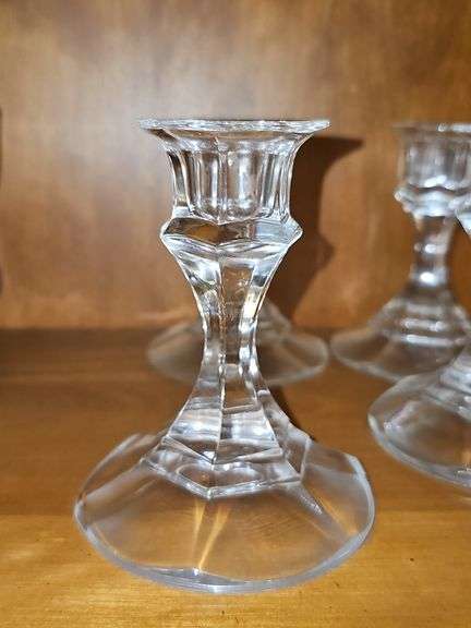 Four candle sticks and epergne base.
