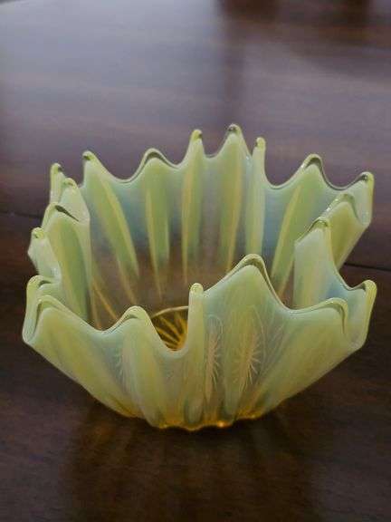 Yellow glass bowl. 5x4 in tall.