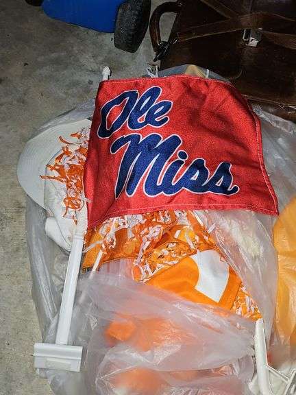 Car flags and pom poms for Ole Miss and UT Vols.