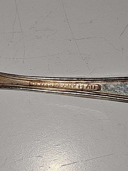 Old company plate flatware possibly Signature Rose pattern. 12 dinner forks, 10 dinner knives six soup spoons 9 teaspoons monogrammed H. Circa 1940s