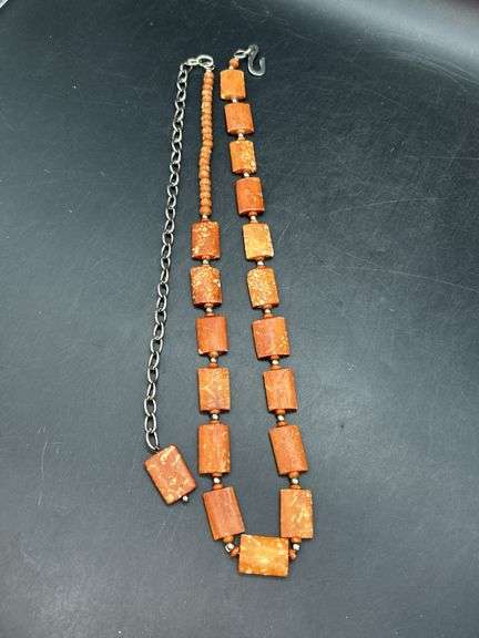 Adjustable waist size rust colored beaded ladies belt