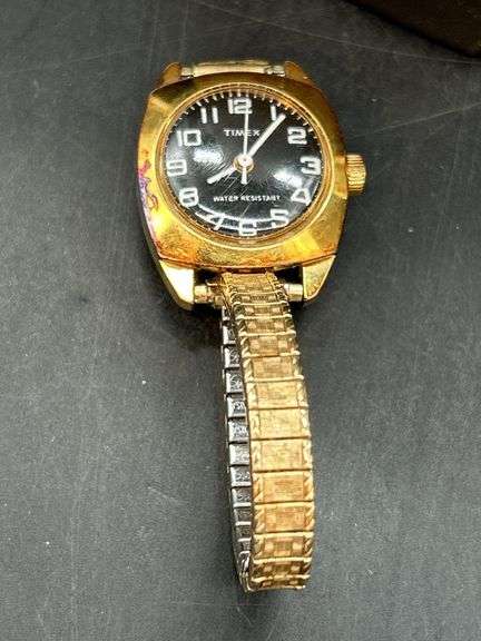 2 vintage ladies watches with stretchy bands…..top is by Timex and lower is 10K gold filled by Elgin and needs hands repaired